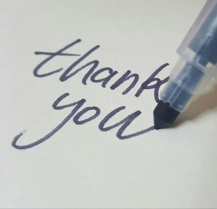 thank you written with calligraphy pen